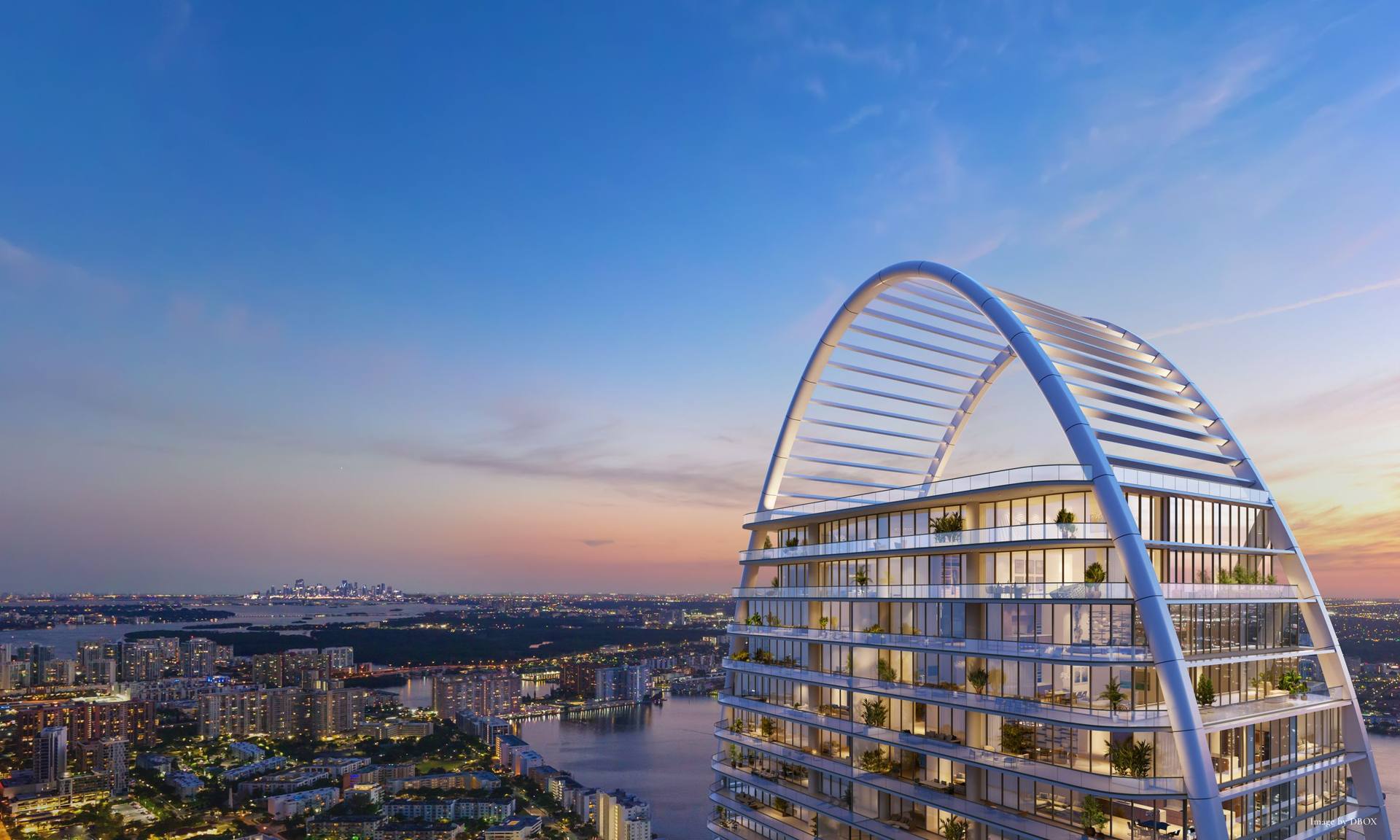 The elliptical crown at dusk — The St. Regis Residences, Sunny Isles Beach (artist rendering)